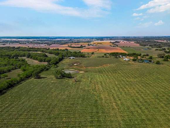 80 Acres of Land with Home for Sale in Adrian, Missouri