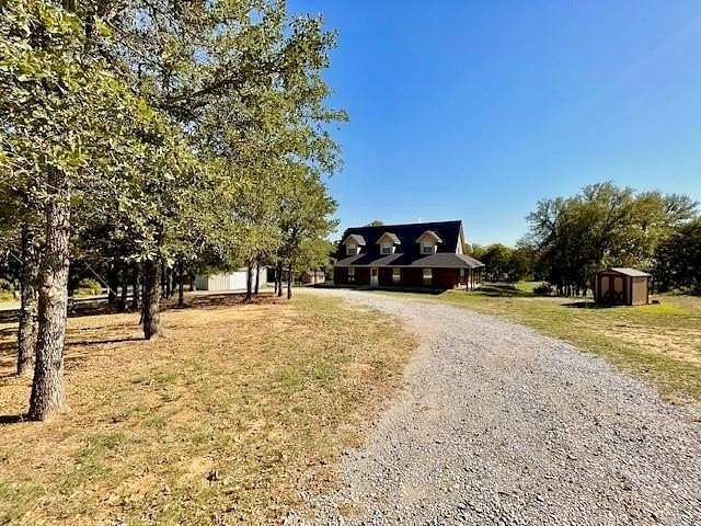 11.02 Acres of Land with Home for Sale in Decatur, Texas