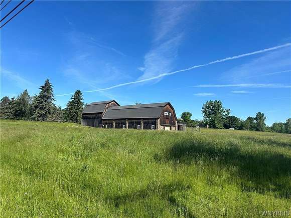 71.5 Acres of Land with Home for Sale in Aurora Town, New York