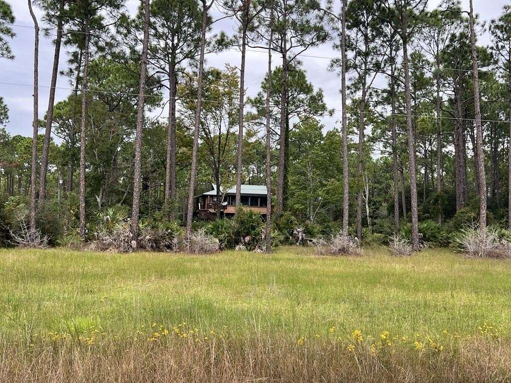 4.9 Acres of Residential Land with Home for Sale in Port St. Joe, Florida