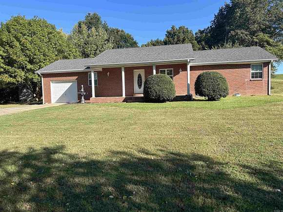 2 Acres of Residential Land with Home for Sale in Piggott, Arkansas