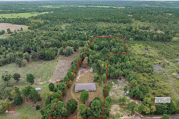 6.621 Acres of Land with Home for Sale in Winona, Texas