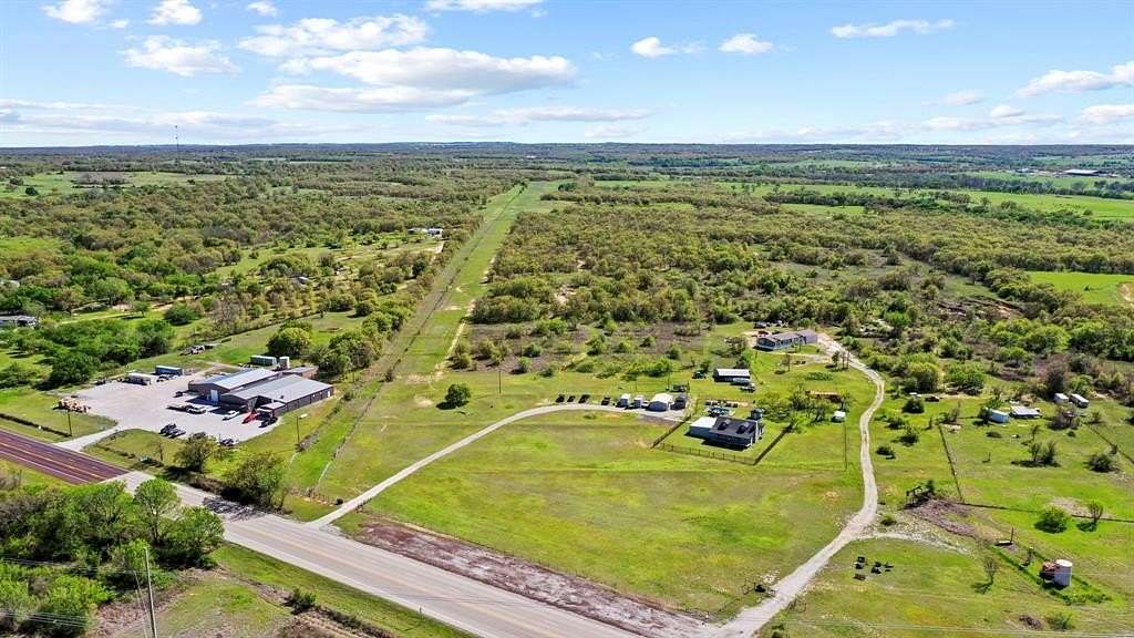 23 Acres of Land with Home for Sale in Poolville, Texas