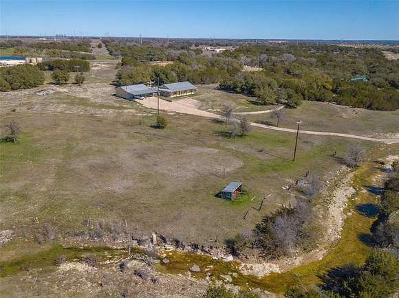 10.2 Acres of Land with Home for Sale in Granbury, Texas