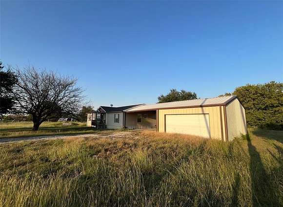 7.15 Acres of Residential Land with Home for Sale in Royse City, Texas