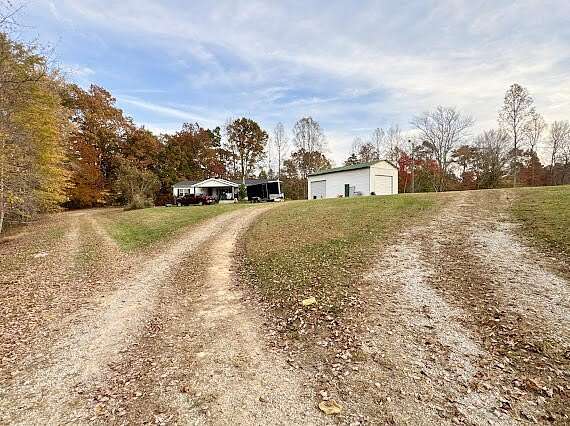 2.79 Acres of Residential Land with Home for Sale in Woodbine, Kentucky