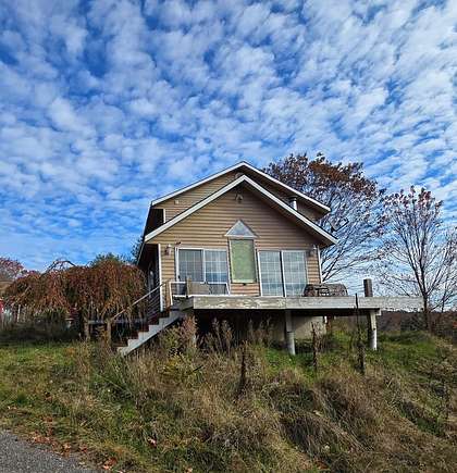 23.8 Acres of Land with Home for Sale in Lockwood, New York