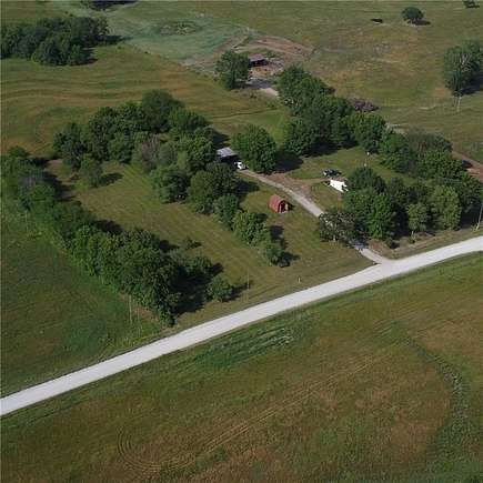 4.4 Acres of Residential Land with Home for Sale in Warrensburg, Missouri