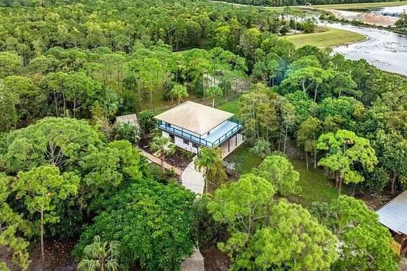 5.27 Acres of Land with Home for Sale in The Acreage, Florida