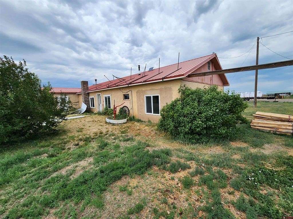 31.1 Acres of Agricultural Land with Home for Sale in Antonito, Colorado