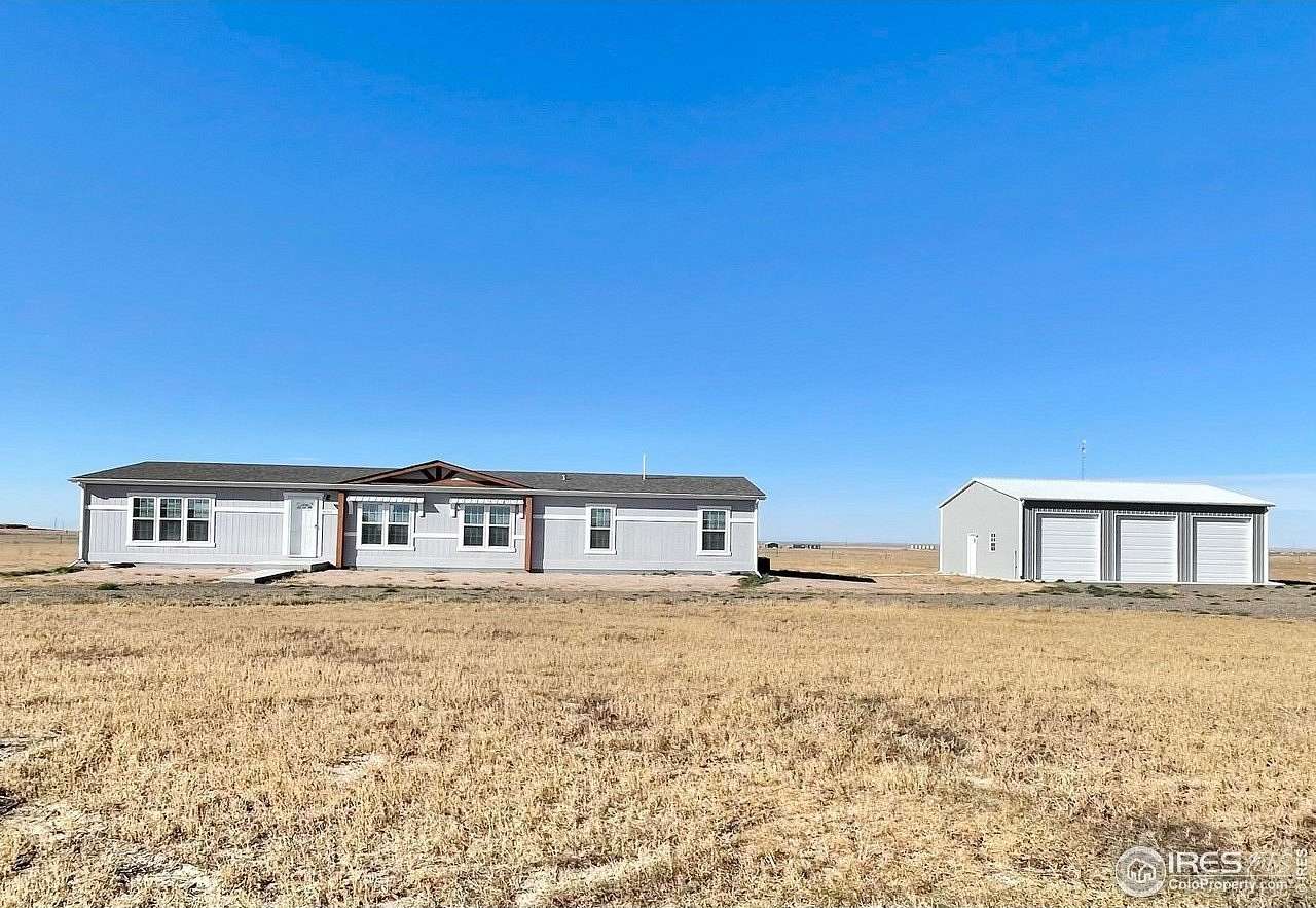 5 Acres of Residential Land with Home for Sale in Briggsdale, Colorado