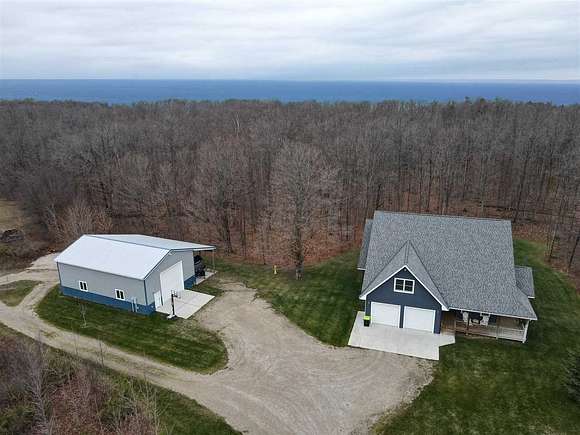 12 Acres of Recreational Land with Home for Sale in Charlevoix, Michigan