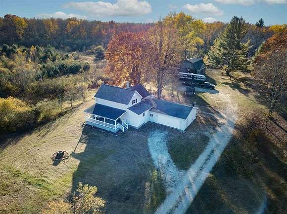 31.91 Acres of Agricultural Land with Home for Sale in Pinconning, Michigan