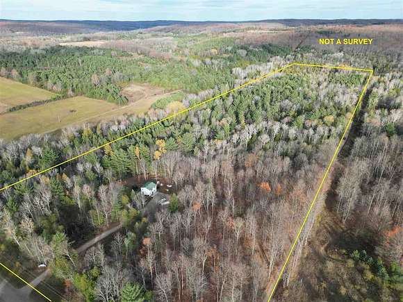 32 Acres of Recreational Land with Home for Sale in East Jordan, Michigan