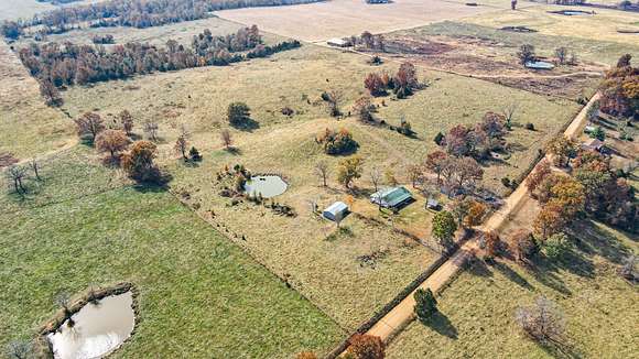 10 Acres of Land with Home for Sale in West Plains, Missouri