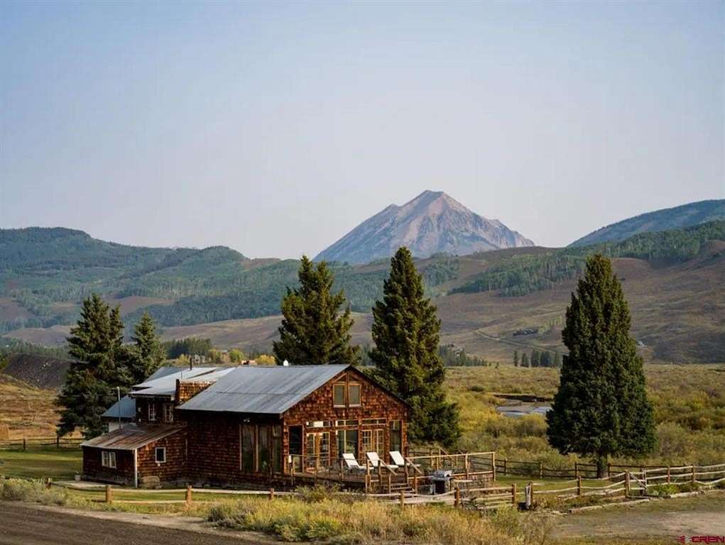 6.95 Acres of Residential Land with Home for Sale in Crested Butte, Colorado