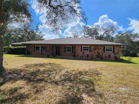 4.77 Acres of Residential Land with Home for Sale in Hudson, Florida