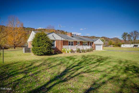 3.4 Acres of Residential Land with Home for Sale in Erwin, Tennessee