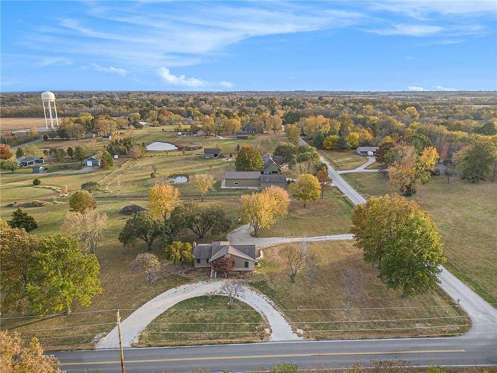 3.01 Acres of Residential Land with Home for Sale in Raymore, Missouri