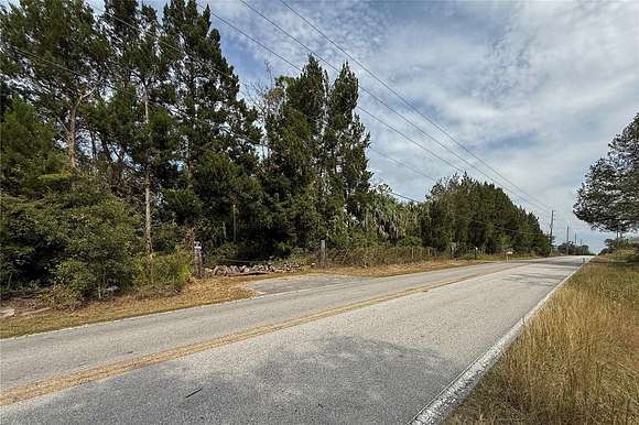 5 Acres of Residential Land with Home for Sale in Spring Hill, Florida