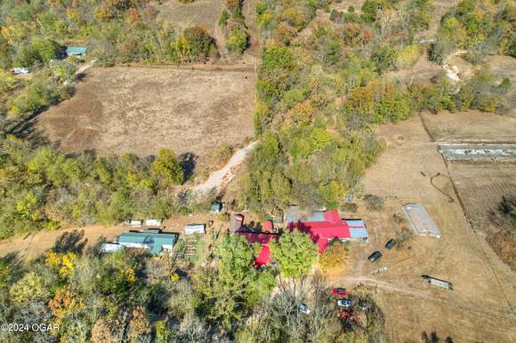 55 Acres of Land with Home for Sale in Noel, Missouri