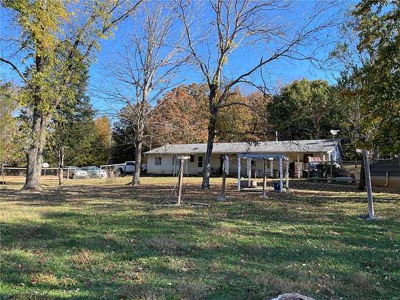 10.94 Acres of Land with Home for Sale in Piedmont, Missouri