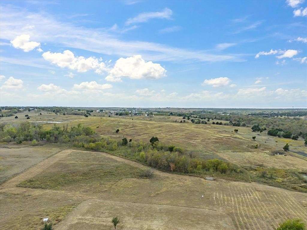 12.42 Acres of Land with Home for Sale in Ennis, Texas