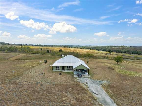 12.42 Acres of Land with Home for Sale in Ennis, Texas