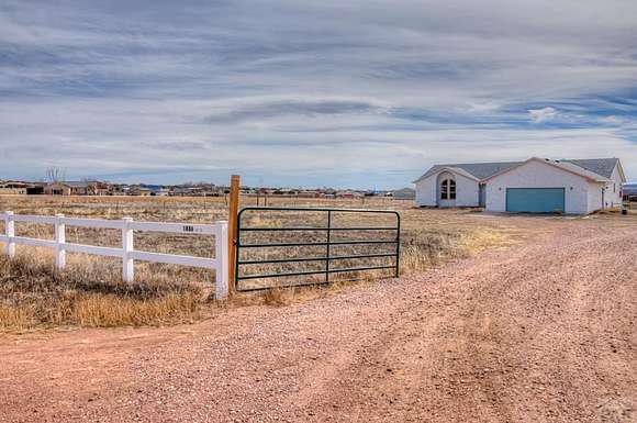 4.97 Acres of Residential Land with Home for Sale in Penrose, Colorado