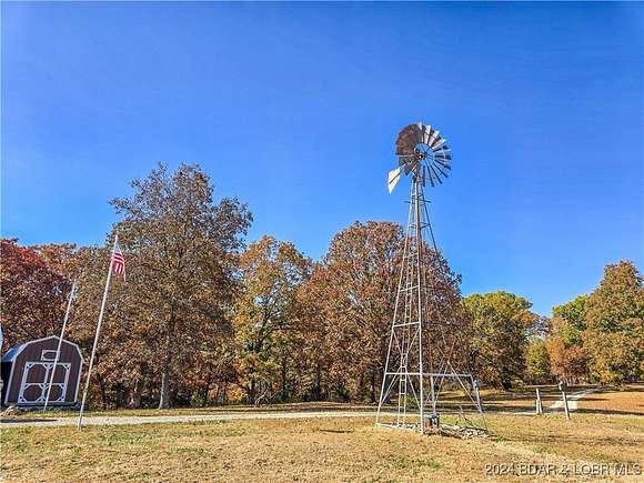 61.95 Acres of Land with Home for Sale in Stover, Missouri