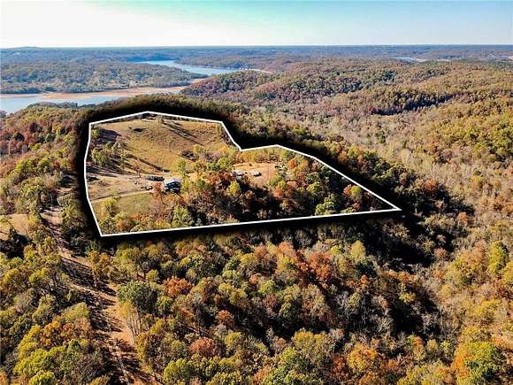 18.5 Acres of Land with Home for Sale in Rogers, Arkansas