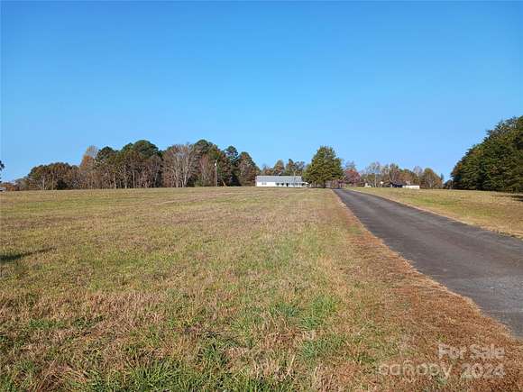 23.12 Acres of Land with Home for Sale in Valdese, North Carolina