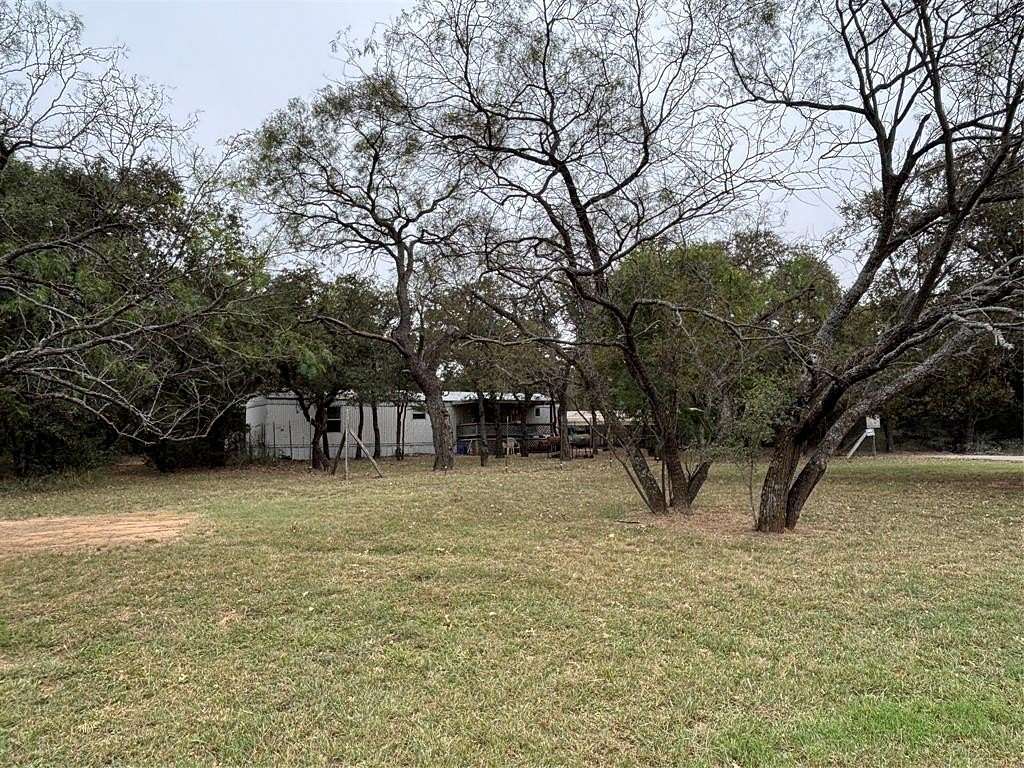5.1 Acres of Land with Home for Sale in Bangs, Texas