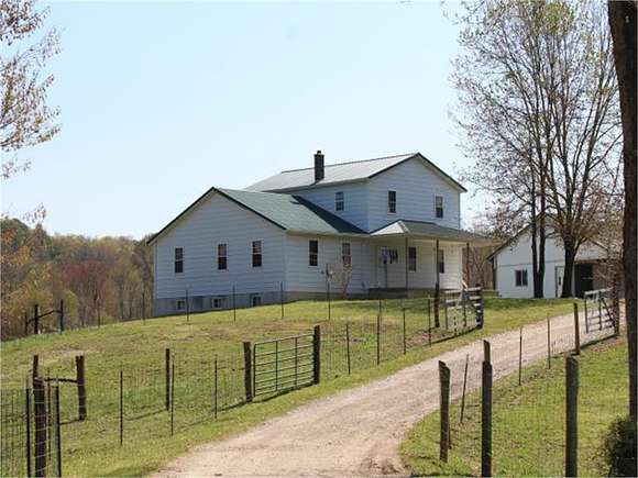 11.08 Acres of Land with Home for Sale in Owingsville, Kentucky