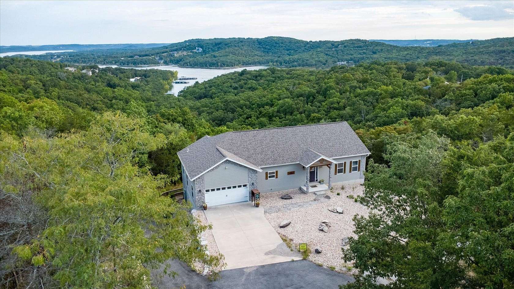 3.6 Acres of Residential Land with Home for Sale in Reeds Spring, Missouri