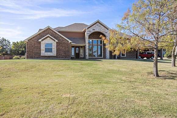 9.736 Acres of Residential Land with Home for Sale in Weatherford, Texas