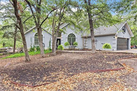 4.89 Acres of Residential Land with Home for Sale in Royse City, Texas