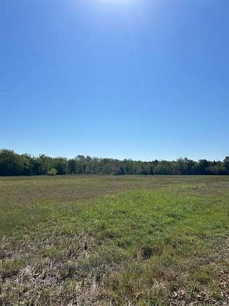 9.818 Acres of Residential Land with Home for Sale in Honey Grove, Texas