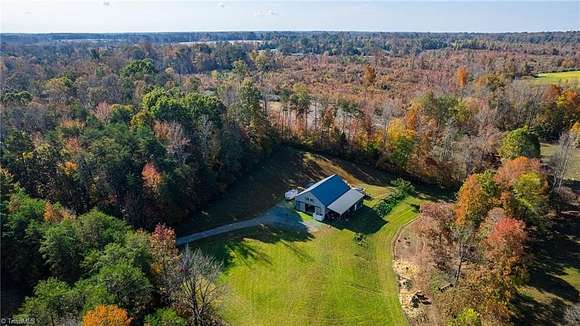 8.88 Acres of Land with Home for Sale in Gibsonville, North Carolina