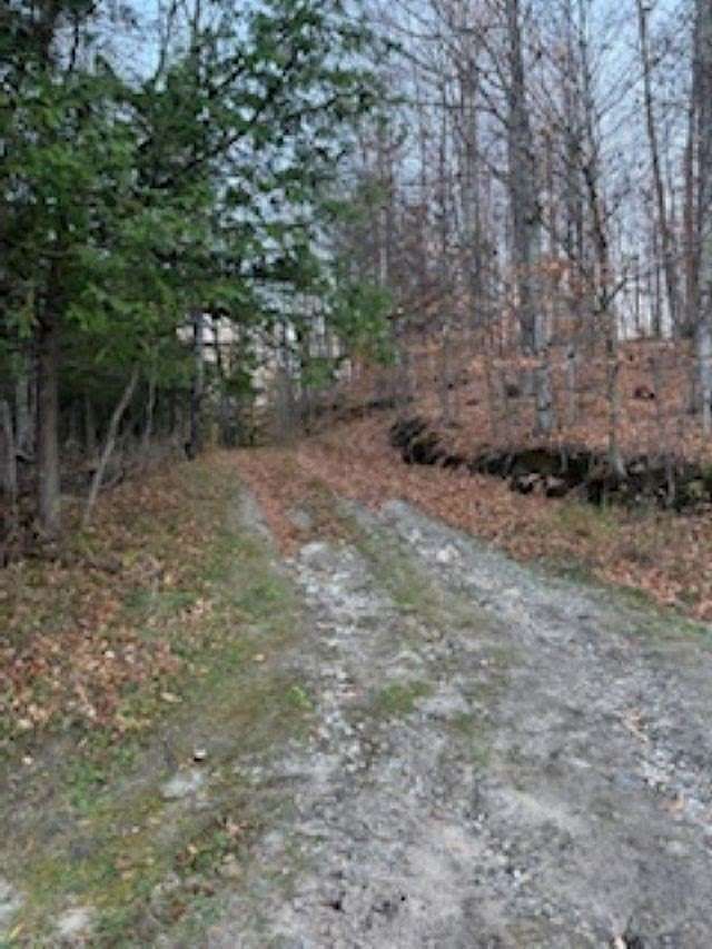 9 Acres of Residential Land with Home for Sale in Boyne City, Michigan