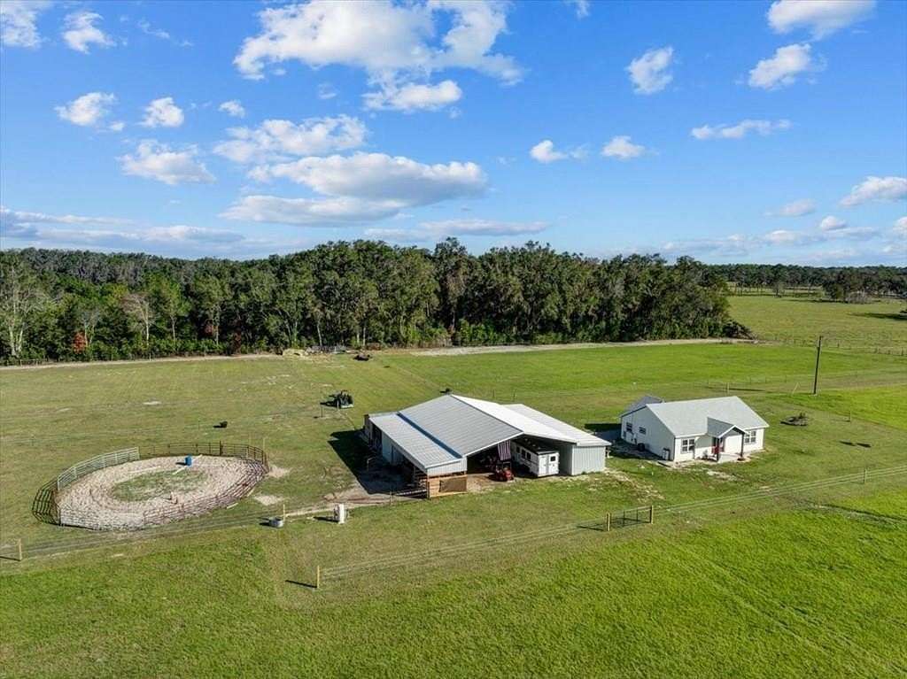 20.24 Acres of Agricultural Land with Home for Sale in Chiefland, Florida