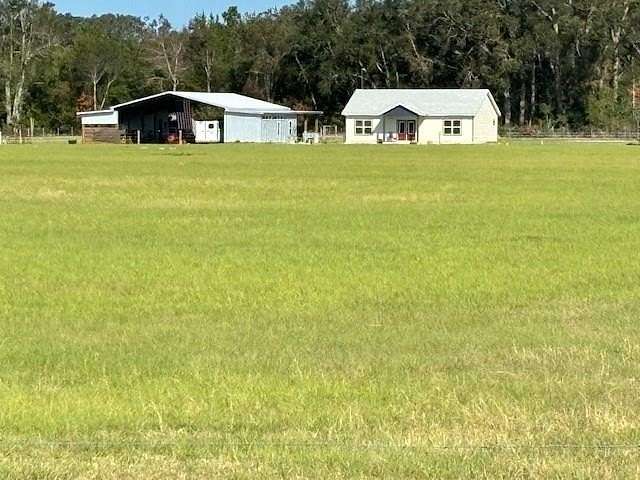 20.2 Acres of Agricultural Land with Home for Sale in Chiefland, Florida