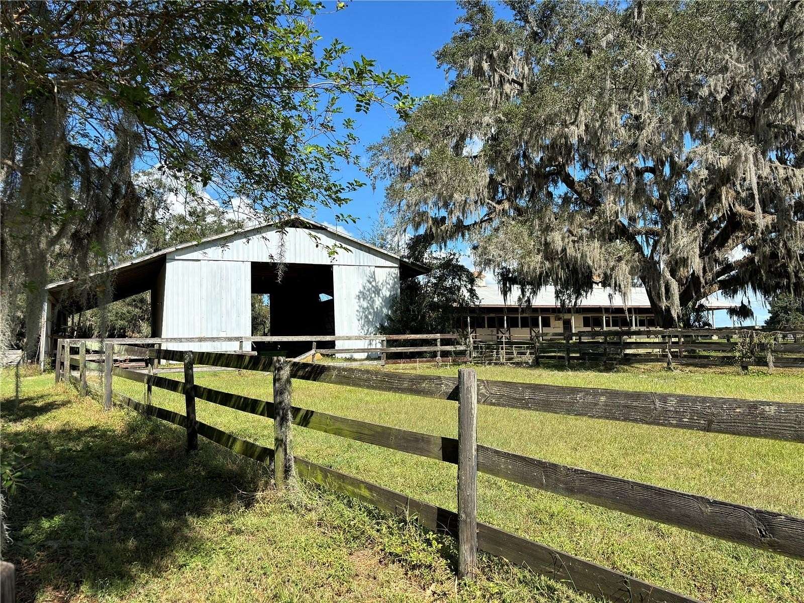 22.15 Acres of Agricultural Land with Home for Sale in Reddick, Florida