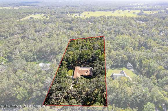 2.53 Acres of Residential Land with Home for Sale in Brooksville, Florida