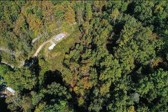 15.6 Acres of Land with Home for Sale in Speedwell, Tennessee