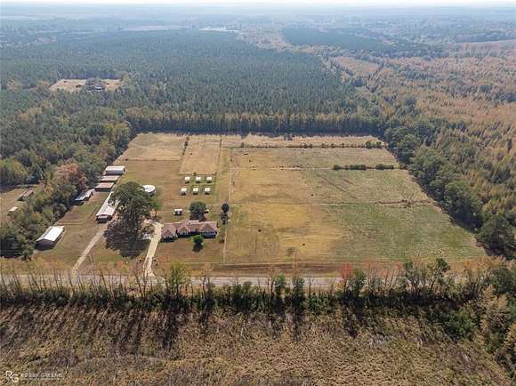 16.687 Acres of Land with Home for Sale in Plain Dealing, Louisiana