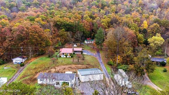 5.05 Acres of Residential Land with Home for Sale in Powell, Tennessee