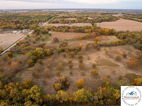 120 Acres of Land with Home for Sale in Rich Hill, Missouri