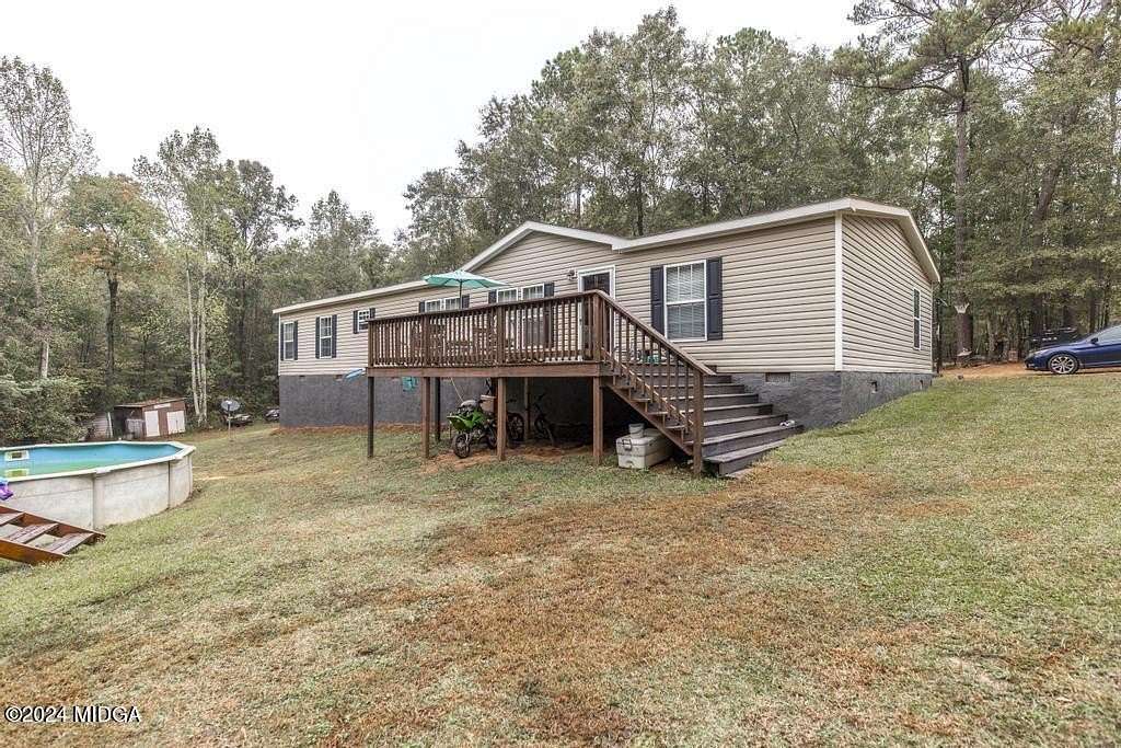 39.33 Acres of Land with Home for Sale in Dry Branch, Georgia