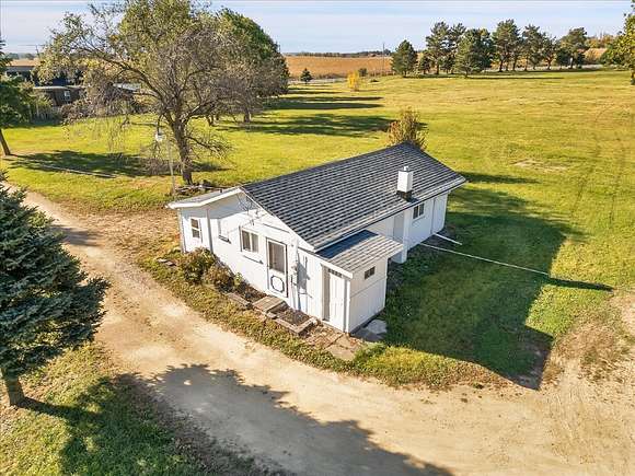 39 Acres of Land with Home for Sale in Harvard, Illinois